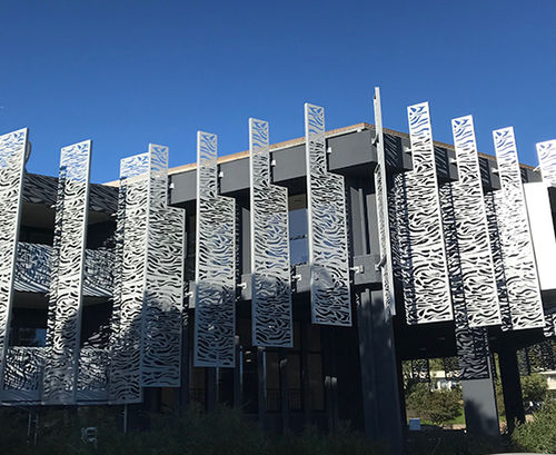 Brise-soleil en métal - Groupe Lorillard - en bois / pour toiture / pour façade