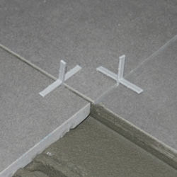 Système de nivellement en PVC - PECFIX  - PECOL GROUP SA - pour carrelage / manuel