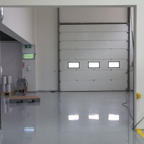Porte industrielle sectionnelle - ICAT®  - RSA Door Systems - en acier galvanisé / en polyuréthane / de sécurité