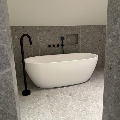 Baignoire ovale - IKTO Design - à poser / pour habitat / en pierre