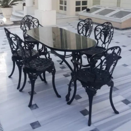 Table contemporaine - ARTAY Lighting - en fonte d'aluminium / avec piètement en métal / ovale