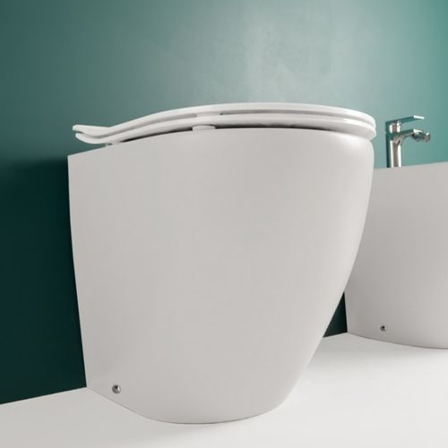 WC à poser - COVER - Ceramica Althea - en céramique / résidentiel / allongé