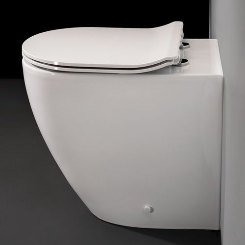 WC près du mur - COVER XL - Ceramica Althea - en céramique / résidentiel / allongé