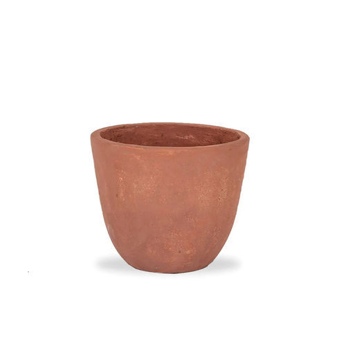 Pot de jardin en béton - Unopiù - en marbre / rond / résidentiel