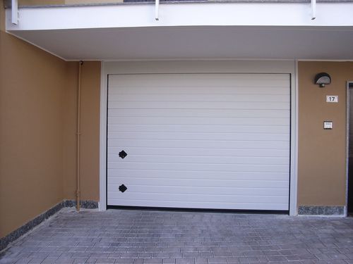 Porte de garage sectionnelle - ARES - Breda Sistemi Industriali S.p.A. - Portoni Seziona - en acier / automatique