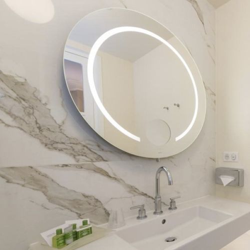 Miroir de salle de bain rond - SADIR - MONTELEONE - mural / pour hôtel / pour chambre d'hôtel