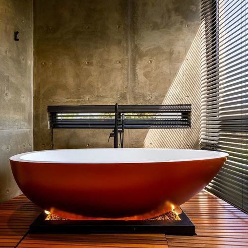 Baignoire asymétrique - ELAINE - Dado Creations Pty (LTD) - en îlot / en Solid Surface / en fonte minérale