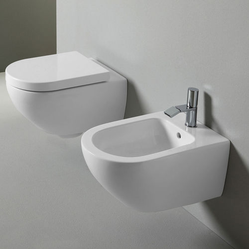 WC suspendu - ENJOY - TALCO - Ceramica Cielo - en céramique / par Karim Rashid / ovale