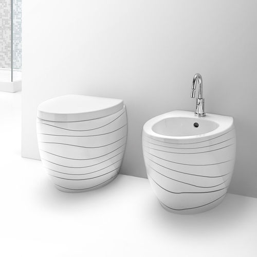 WC à poser - S541 - A. e T. ITALIA - en céramique / résidentiel / ovale