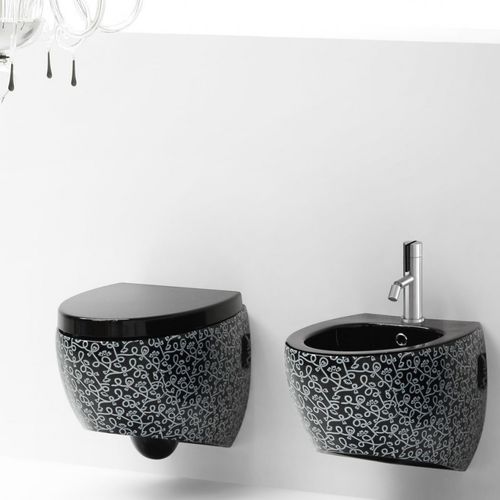 WC suspendu - S511 - A. e T. ITALIA - en céramique / résidentiel / ovale