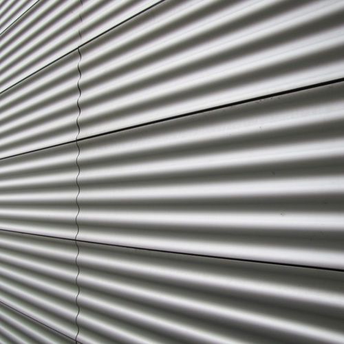 Bardage en panneaux - WAVE 200 - PROMOCLAD - en aluminium / ondulé / de grand format