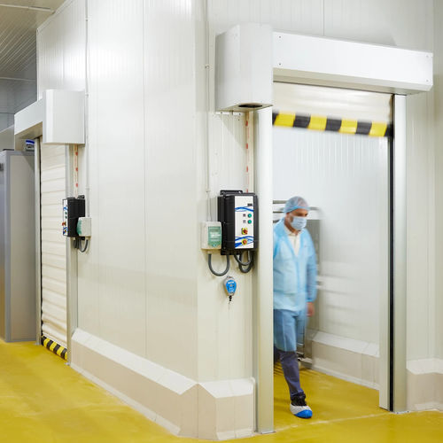 Porte industrielle enroulable - Manusa - en aluminium anodisé / en polyester / automatique
