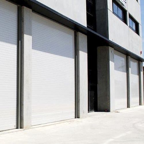 Porte industrielle sectionnelle - EST&Aacute;NDAR - Manusa - en polyuréthane / en acier / isolante