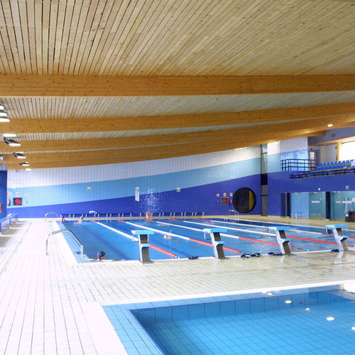 Charpente en bois lamellé-collé - PISCINA CAMPOS GÓTICOS - Lanik - de charpente / pour piscine publique