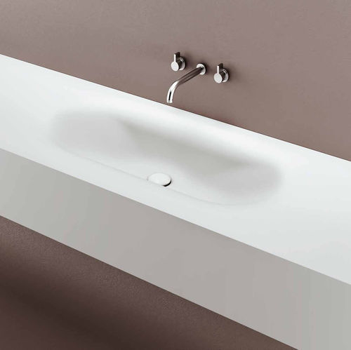 Vasque intégrée - MOBY - PLANIT - en Corian® / avec plan intégré / ovale