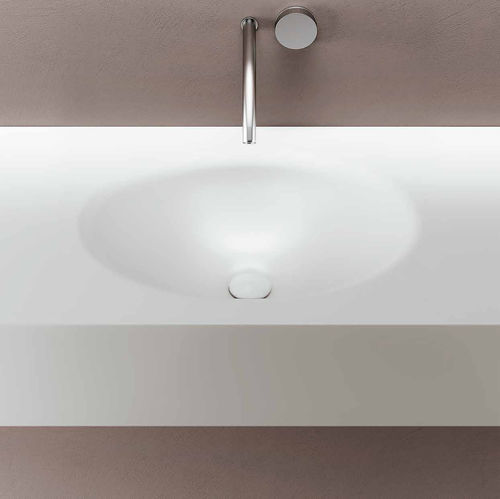 Vasque intégrée - SMOOTH - PLANIT - en Corian® / avec plan intégré / ovale