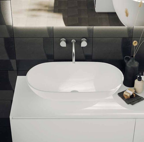 Vasque à poser - CONCAVE - PLANIT - en Corian® / ovale / sans trou