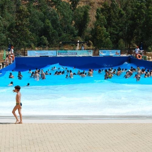 Piscine à vagues - TECNOPISCINE INTERNATIONAL - d'extérieur / pour parc aquatique / enterrée