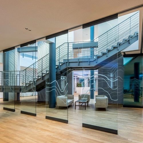 Cloison coulissante - KRISTAL - ESTFELLER - pliante / vitrée / en aluminium