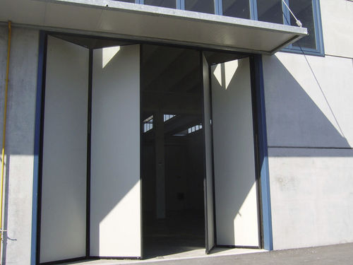 Porte industrielle pliante - ALLMURA - MURA - en métal / automatique / de sécurité