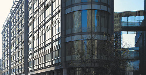 Mur-rideau en panneaux - FLEET STREET - Permasteelisa - en pierre / en métal et en verre