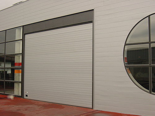 Porte industrielle sectionnelle - Angel Mir – Portes Bisbal - en acier / acoustique / pour établissement public