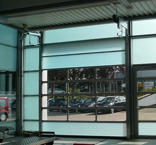Porte industrielle sectionnelle - SPACELITE HT  - Angel Mir – Portes Bisbal - en fibre de verre / pour l'industrie agroalimentaire / semi-vitrée