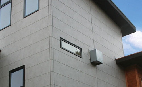 Bardage en panneaux - EMPIREBLOCK™ - NICHIHA FIBER CEMENT - en fibro-ciment / rainuré