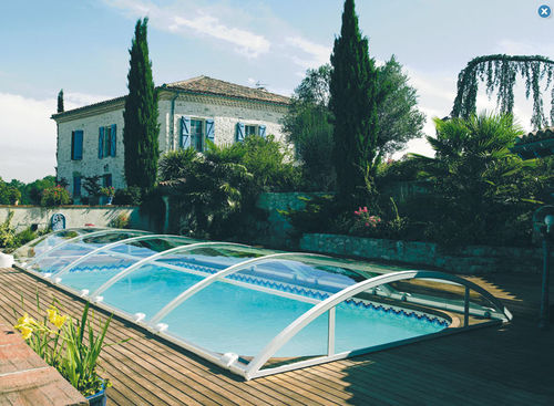 Abri de piscine bas - CRISTAL® - ABRISUD - télescopique / en polycarbonate / motorisé