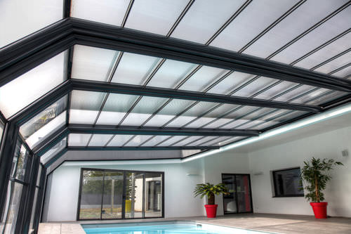 Abri de piscine adossé - CONSERVATORY - ABRISUD - télescopique / en acier inoxydable / avec actionnement manuel