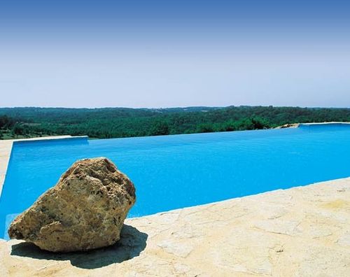 Piscine en blocs à bancher en polymère - HORIZON - PISCINES MAGILINE - à débordement / d'extérieur / enterrée