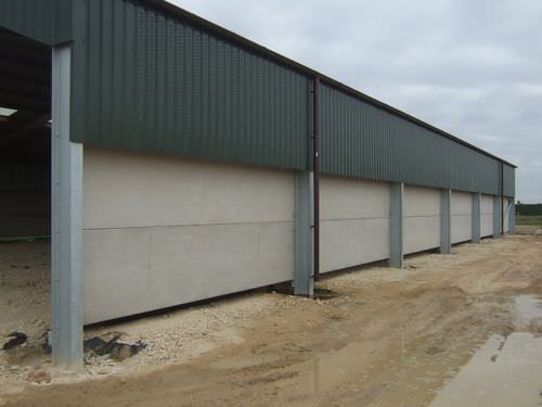 Mur-rideau en panneaux - FEED STORE - Thomas Armstrong - en béton armé précontraint