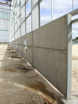 Mur-rideau en panneaux - WAREHOUSE WALLS - Thomas Armstrong - en béton armé précontraint