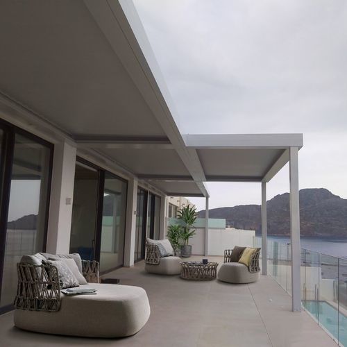 Pergola adossée - CospiBio - COSPICON  SA - aluminium / à lames orientables / à lames brise soleil