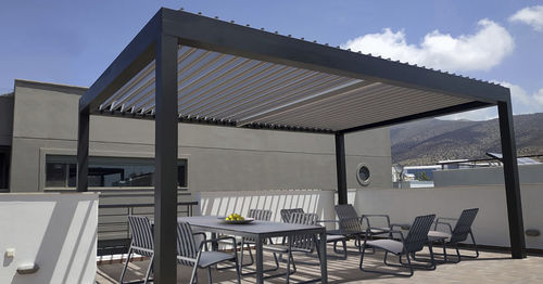 Pergola adossée - CospiBio - COSPICON  SA - aluminium / à lames orientables / à lames brise soleil