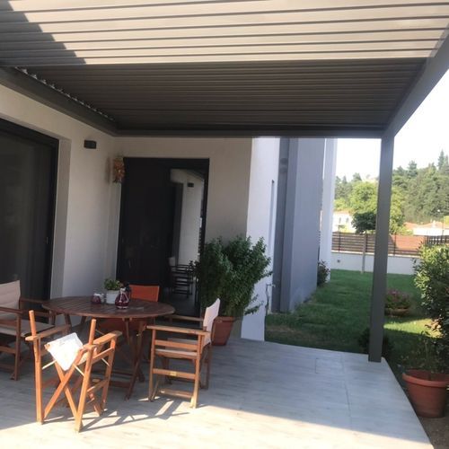 Pergola adossée - CospiBio - COSPICON  SA - en aluminium / à lames orientables / à lames brise soleil