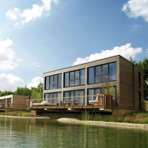 Bâtiment préfabriqué - OXFORD - Riko Hiše - en bois massif / pour logement collectif / contemporain