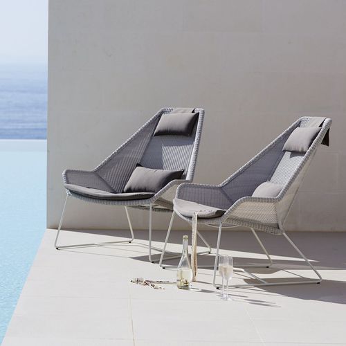 Fauteuil contemporain - BREEZE  - Cane-line A/S - en résine tressée / en résine tressée / avec repose-pieds