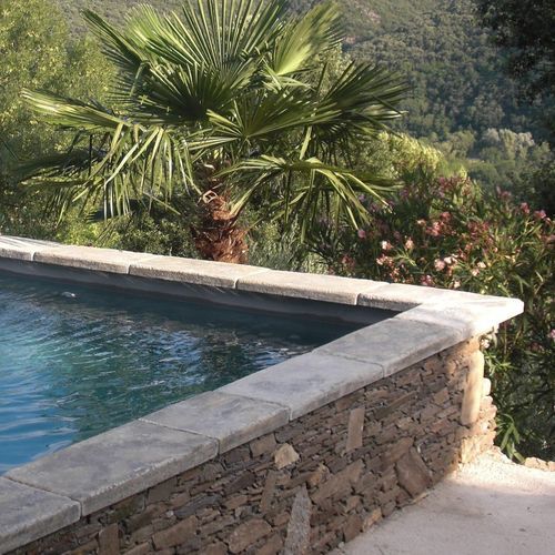 Margelle de piscine en béton - BOURGEOISE - ROUVIERE - de pierre / d'angle