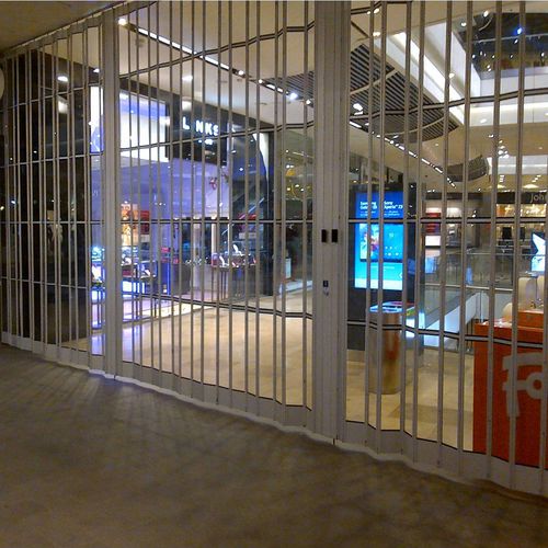 Grille de défense pliante - VISIONGLIDE - Cornell - pour fenêtre / pour devanture de magasin / en aluminium