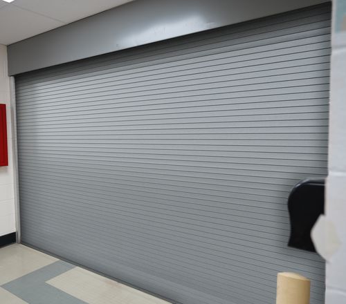 Porte industrielle en acier galvanisé - CROSSINGGARD® & THREATPROTECT™ - Cornell - enroulable / en aluminium anodisé / en aluminium extrudé