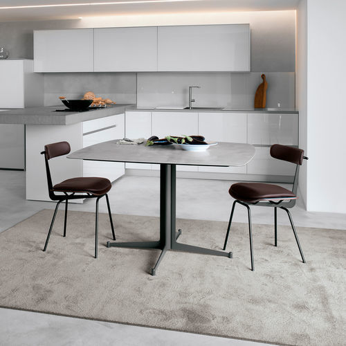 Table contemporaine - T9 - extendo - en HPL / en béton / avec piètement en acier inoxydable