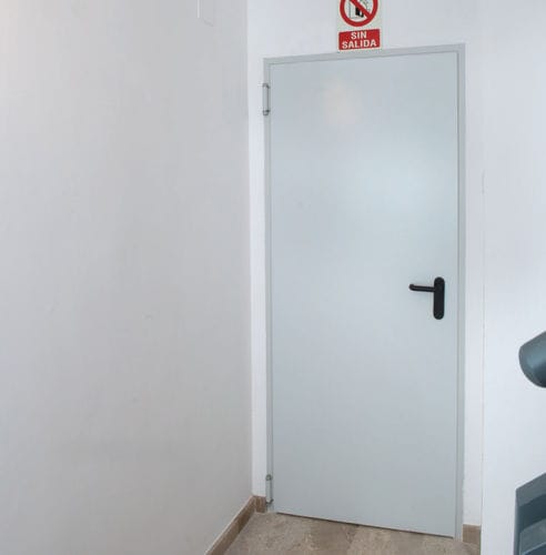 Porte d'intérieur - NEO - Andreu Barberá, S.L. - en tôle d'acier / battante / contemporaine