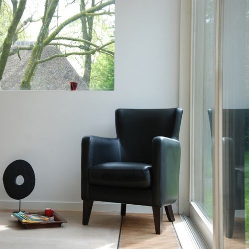 Fauteuil classique - CAROL - MANUEL LARRAGA - en cuir / en tissu / noir
