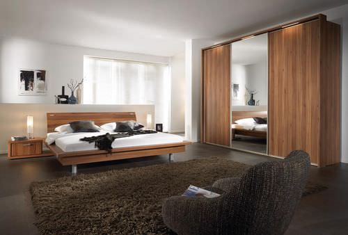 Armoire contemporaine - RAVENNA - Nolte - en bois / à porte coulissante