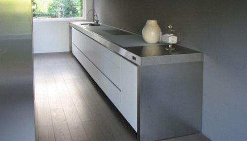 Cuisine contemporaine - BRIDGE - ABK InnoVent - en inox / avec îlot / sans poignée