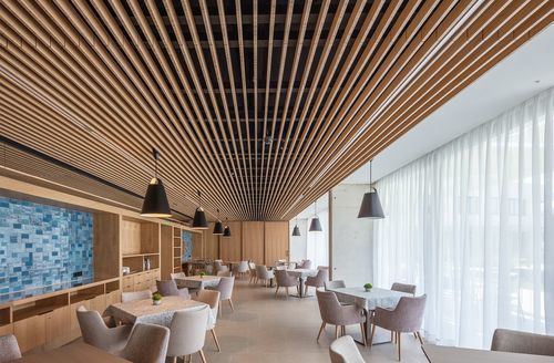 Faux-plafond suspendu en bambou - GUBI-SLATS - Grupo GUBIA - en laine de roche / en lames / d'intérieur