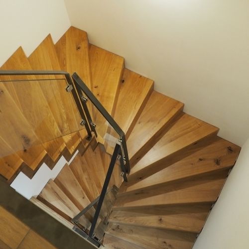 Escalier quart tournant - Créateur d'escaliers Treppenmeister - demi-tournant / à marches en bois / en métal