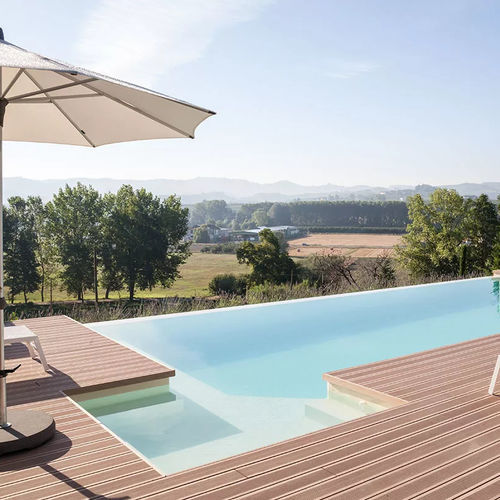 Piscine à débordement - Caraibi - Piscine Acquaform - sur mesure / margelle intégrée / d'extérieur