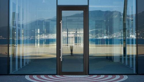 Porte d'extérieur - SMARTIA MD61 - ALUMIL - aluminium / contemporaine / à double vitrage